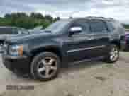 2011 Chevrolet Tahoe LTZ z VIN 1GNSKCE03BR218789, wystawiony jako Copart lot #71005005 z przebiegiem 148 342 mil mil oraz Czysty tytuł • Clean title. Historia ofert i sprzedaży dostępna na DreamBid. Obrazek 1.