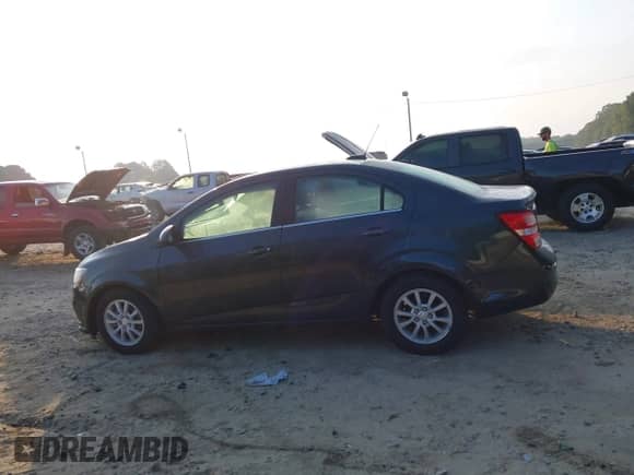 2019 Chevrolet Sonic LT with VIN 1G1JD5SB0K4112452, listed as a IAAI auction lot 43219954 with 30,197 mi miles and . Bid and sale history available at DreamBid. Image 14.