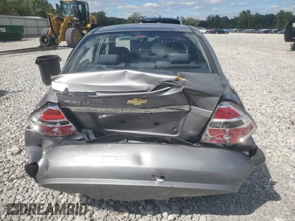 2011 Chevrolet Aveo 1LT with VIN KL1TD5DE7BB142087, listed as a Copart auction lot 71108235 with 76,166 mi miles and Salvage title. Bid and sale history available at DreamBid. Image 6.