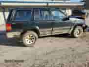 1994 Jeep Grand Cherokee Limited z VIN 1J4GZ78S0RC357283, wystawiony jako Copart lot #49236995 z przebiegiem 84 306 mil mil oraz Szkoda całkowita • Salvage title. Historia ofert i sprzedaży dostępna na DreamBid. Obrazek 3.