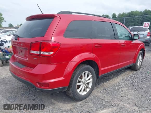 2017 Dodge Journey SXT with VIN 3C4PDDBG0HT574116, listed as a IAAI auction lot 42701428 with 77,246 mi miles and . Bid and sale history available at DreamBid. Image 4.