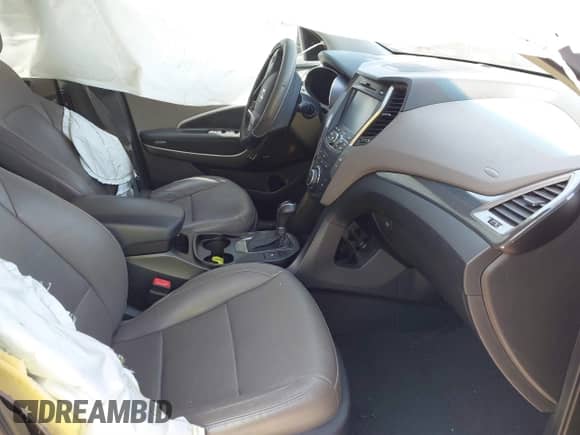 2016 Hyundai Santa Fe z VIN 5XYZW4LA8GG338087, wystawiony jako IAAI lot #41730229 z przebiegiem 156 062 mil mil oraz . Historia ofert i sprzedaży dostępna na DreamBid. Obrazek 5.
