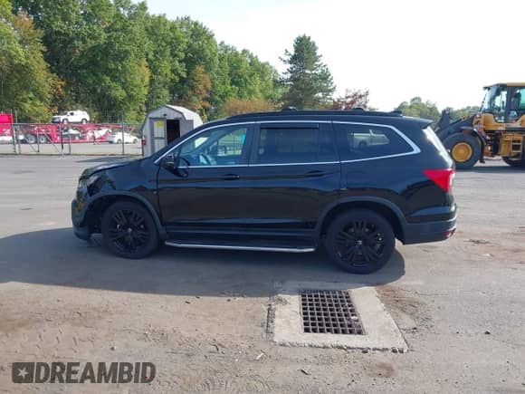 2021 Honda Pilot Special Edition with VIN 5FNYF6H22MB015925, listed as a IAAI auction lot 43332390 with 77,152 mi miles and . Bid and sale history available at DreamBid. Image 14.