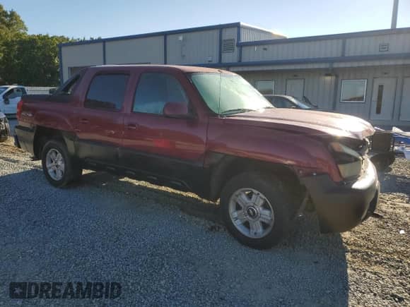2004 Chevrolet Avalanche with VIN 3GNEK12T24G144252, listed as a Copart auction lot 70732535 with 142,122 mi miles and Salvage title. Bid and sale history available at DreamBid. Image 4.