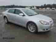 2012 Chevrolet Malibu LTZ with VIN 1G1ZG5E7XCF262396, listed as a Copart auction lot 67108685 with 161,740 mi miles and Salvage title. Bid and sale history available at DreamBid. Image 4.