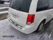 2012 Dodge Grand Caravan SXT with VIN 2C4RDGCG9CR115347, listed as a IAAI auction lot 41217698 with 119,232 mi miles and . Bid and sale history available at DreamBid. Image 4.