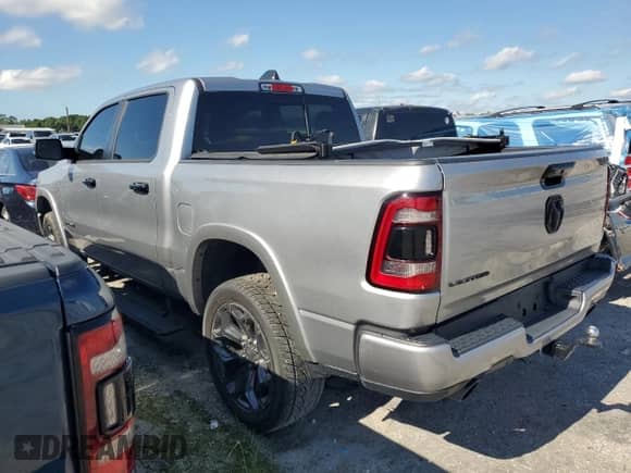 2023 Ram 1500 Limited с VIN 1C6RREHT6PN545617, выставлен на аукционе Copart как лот 84611915 с пробегом 27 013 миль миль и Чистый • Clean title. История ставок и продаж доступна на DreamBid. Изображение 2.