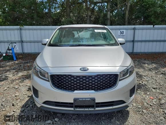 2017 Kia Sedona L z VIN KNDMA5C13H6284071, wystawiony jako Copart lot #66113925 z przebiegiem 80 057 mil mil oraz Szkoda całkowita • Salvage title. Historia ofert i sprzedaży dostępna na DreamBid. Obrazek 5.