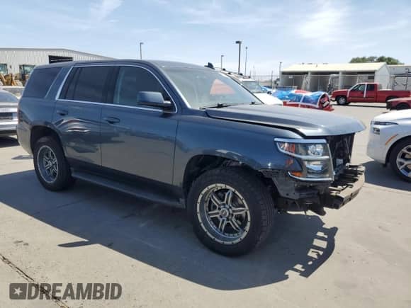 2019 Chevrolet Tahoe with VIN 1GNLCDKC2KR123128, listed as a Copart auction lot 61846905 with 54,604 mi miles and Salvage title. Bid and sale history available at DreamBid. Image 4.