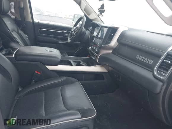 2021 Ram 1500 Laramie z VIN 1C6SRFJT2MN665900, wystawiony jako IAAI lot #41395486 z przebiegiem 36 256 mil mil oraz . Historia ofert i sprzedaży dostępna na DreamBid. Obrazek 5.