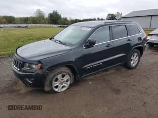 2014 Jeep Grand Cherokee Laredo z VIN 1C4RJFAG6EC321873, wystawiony jako Copart lot #85276075 z przebiegiem 182 528 mil mil oraz Szkoda całkowita • Salvage title. Historia ofert i sprzedaży dostępna na DreamBid. Obrazek 1.