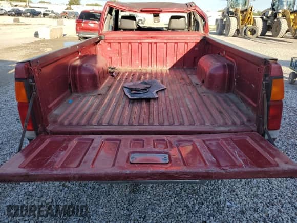 1995 Nissan Frontier XE with VIN 1N6HD16S9SC448984, listed as a Copart auction lot 72807634 with 244,726 mi miles and Salvage title. Bid and sale history available at DreamBid. Image 11.