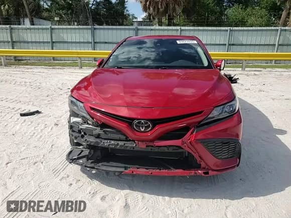 2023 Toyota Camry SE z VIN 4T1G11AK7PU120197, wystawiony jako Copart lot #69823055 z przebiegiem 55 573 mil mil oraz Szkoda całkowita • Salvage title. Historia ofert i sprzedaży dostępna na DreamBid. Obrazek 14.