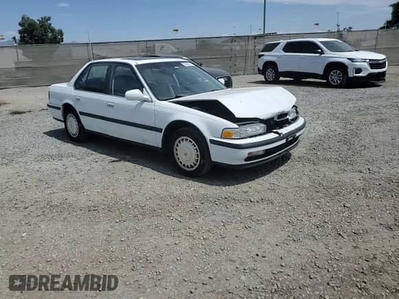 1991 Honda Accord with VIN JHMCB7664MC081955, listed as a Copart auction lot 69637115 with 169,851 mi miles and Salvage title. Bid and sale history available at DreamBid. Image 13.
