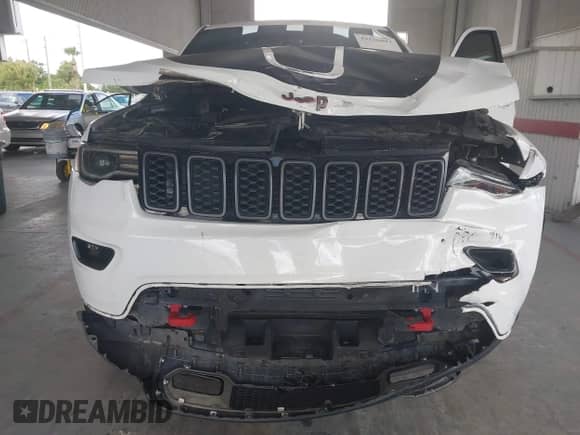 2020 Jeep Grand Cherokee Trailhawk with VIN 1C4RJFLG6LC387690, listed as a IAAI auction lot 43126007 with 67,940 mi miles and . Bid and sale history available at DreamBid. Image 6.