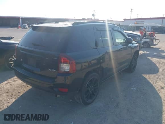 2014 Jeep Compass Sport with VIN 1C4NJCBA4ED785777, listed as a IAAI auction lot 43415977 with 146,175 mi miles and . Bid and sale history available at DreamBid. Image 4.