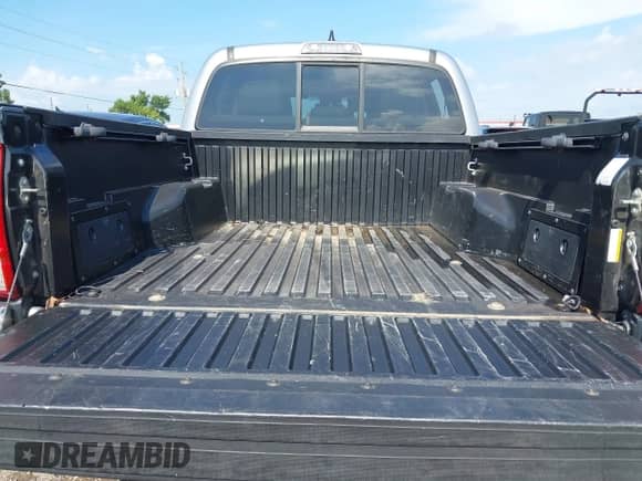 2017 Toyota Tacoma SR5 with VIN 5TFAZ5CN7HX047818, listed as a IAAI auction lot 42637798 with 131,616 mi miles and . Bid and sale history available at DreamBid. Image 17.