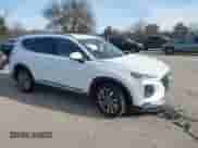 2019 Hyundai Santa Fe SEL with VIN 5NMS3CAD4KH018717, listed as a IAAI auction lot 41240409 with 116,871 mi miles and . Bid and sale history available at DreamBid. Image 1.