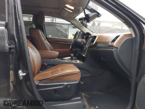 2015 Jeep Grand Cherokee Summit с VIN 1C4RJFJM6FC775709, выставлен на аукционе IAAI как лот 42818098 с пробегом 104 979 миль миль и . История ставок и продаж доступна на DreamBid. Изображение 5.