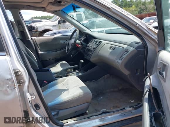 2002 Honda Accord SE z VIN 1HGCG66822A049658, wystawiony jako IAAI lot #43113859 z przebiegiem Nie podano mil oraz . Historia ofert i sprzedaży dostępna na DreamBid. Obrazek 5.