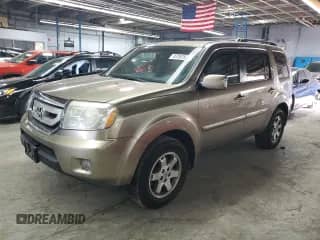 2009 Honda Pilot Touring with VIN 5FNYF48869B039483, listed as a Copart auction lot 87257535 with 262,722 mi miles and Clean title. Bid and sale history available at DreamBid. Image 1.