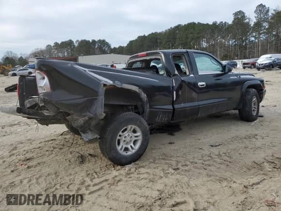 2002 Dodge Dakota с VIN 1B7GL12X52S669183, выставлен на аукционе Copart как лот 89385785 с пробегом 115 026 миль миль и Списание • Salvage title. История ставок и продаж доступна на DreamBid. Изображение 3.