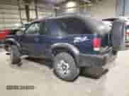2001 Chevrolet Blazer LS z VIN 1GNCT18W01K143093, wystawiony jako Copart lot #82650514 z przebiegiem Nie podano mil oraz Szkoda całkowita • Salvage title. Historia ofert i sprzedaży dostępna na DreamBid. Obrazek 2.