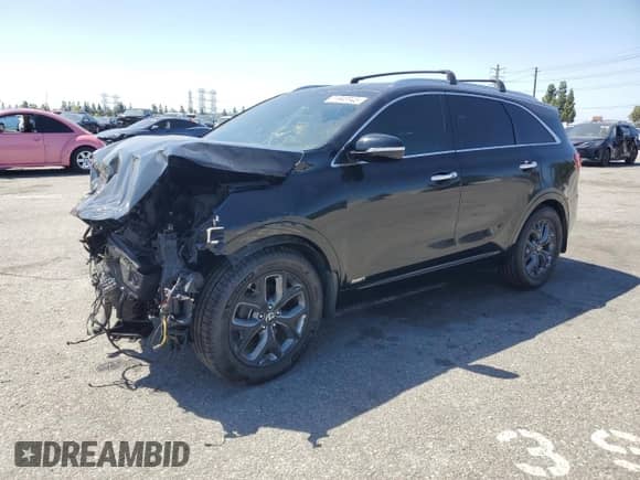 2016 Kia Sorento SXL с VIN 5XYPKDA19GG016449, выставлен на аукционе Copart как лот 56943845 с пробегом 72 350 миль миль и Списание • Salvage title. История ставок и продаж доступна на DreamBid. Изображение 1.