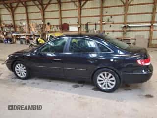 2009 Hyundai Azera Limited z VIN KMHFC46F99A373416, wystawiony jako Copart lot #72311094 z przebiegiem 179 978 mil mil oraz Czysty tytuł • Clean title. Historia ofert i sprzedaży dostępna na DreamBid. Obrazek 2.