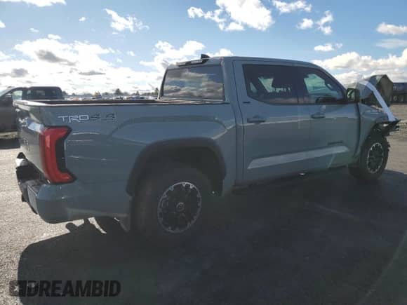 2023 Toyota Tundra SR5 with VIN 5TFLA5DB5PX098897, listed as a Copart auction lot 82638805 with 54,053 mi miles and Salvage title. Bid and sale history available at DreamBid. Image 3.