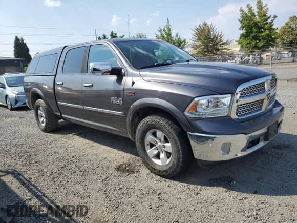 2015 Ram 1500 Laramie z VIN 1C6RR7VM8FS689033, wystawiony jako Copart lot #71743295 z przebiegiem 246 760 mil mil oraz Szkoda całkowita • Salvage title. Historia ofert i sprzedaży dostępna na DreamBid. Obrazek 4.