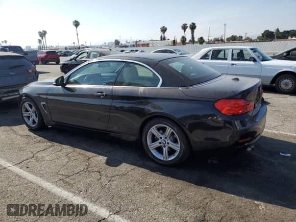 2015 BMW 4 Series 428i with VIN WBA3V7C50FP772347, listed as a Copart auction lot 57513835 with 65,695 mi miles and Salvage title. Bid and sale history available at DreamBid. Image 2.