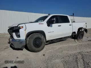 2023 Chevrolet Silverado 2500HD Work Truck z VIN 1GC1YLE71PF138657, wystawiony jako Copart lot #66534035 z przebiegiem 77 099 mil mil oraz Szkoda całkowita • Salvage title. Historia ofert i sprzedaży dostępna na DreamBid. Obrazek 1.