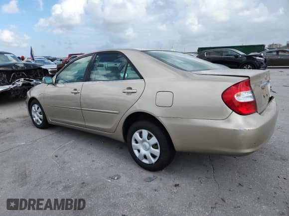 2002 Toyota Camry LE z VIN JTDBE32K020068442, wystawiony jako Copart lot #85160605 z przebiegiem Nie podano mil oraz Szkoda całkowita • Salvage title. Historia ofert i sprzedaży dostępna na DreamBid. Obrazek 2.