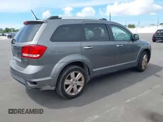 2012 Dodge Journey Crew with VIN 3C4PDCDG3CT207176, listed as a IAAI auction lot 43242158 with 173,632 mi miles and . Bid and sale history available at DreamBid. Image 4.