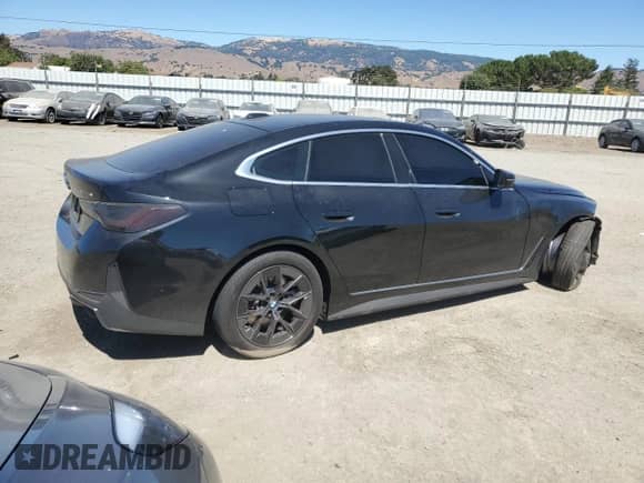 2025 BMW i4 eDrive40 z VIN WBY23HD01SFU14069, wystawiony jako Copart lot #69321205 z przebiegiem 6 756 mil mil oraz Szkoda całkowita • Salvage title. Historia ofert i sprzedaży dostępna na DreamBid. Obrazek 3.