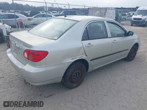 2004 Toyota Corolla CE with VIN JTDBR32EX42043375, listed as a IAAI auction lot 43285995 with Not provided miles and . Bid and sale history available at DreamBid. Image 4.