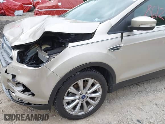 2017 Ford Escape Titanium with VIN 1FMCU9JD0HUC89677, listed as a IAAI auction lot 43418612 with 30,638 mi miles and . Bid and sale history available at DreamBid. Image 20.