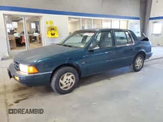 1994 Dodge Spirit Highline z VIN 1B3AA4636RF148742, wystawiony jako Copart lot #45249505 z przebiegiem 89 040 mil mil oraz Szkoda całkowita • Salvage title. Historia ofert i sprzedaży dostępna na DreamBid. Obrazek 1.