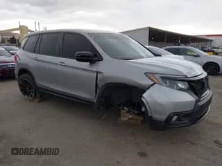 2021 Honda Passport Sport with VIN 5FNYF7H22MB009032, listed as a IAAI auction lot 43311158 with 65,919 mi miles and . Bid and sale history available at DreamBid. Image 1.