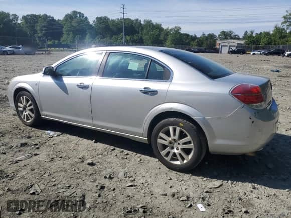 2009 Saturn Aura XR with VIN 1G8ZV57B39F234473, listed as a Copart auction lot 56004655 with 158,381 mi miles and Salvage title. Bid and sale history available at DreamBid. Image 2.