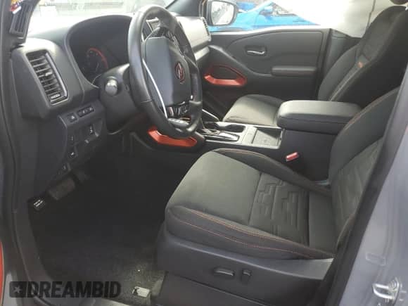 2023 Nissan Frontier Pro-4X with VIN 1N6ED1EK7PN651968, listed as a Copart auction lot 61585105 with 17,354 mi miles and Salvage title. Bid and sale history available at DreamBid. Image 7.