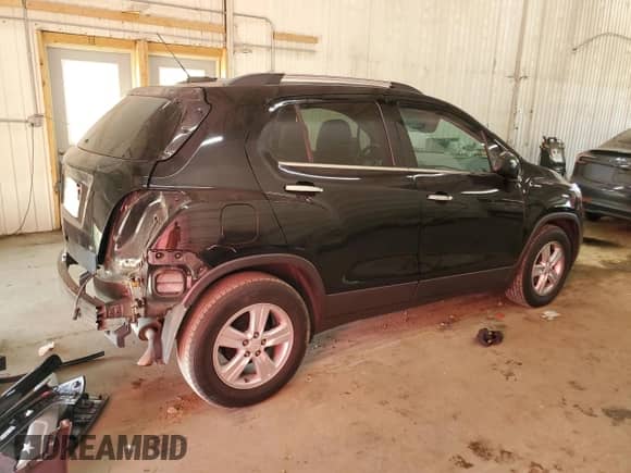 2020 Chevrolet Trax LT с VIN 3GNCJLSB1LL333381, выставлен на аукционе Copart как лот 84385805 с пробегом 96 594 миль миль и Списание • Salvage title. История ставок и продаж доступна на DreamBid. Изображение 3.