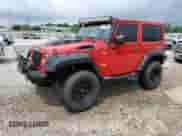 2014 Jeep Wrangler Sahara z VIN 1C4AJWBG0EL148282, wystawiony jako Copart lot #65809385 z przebiegiem 122 443 mil mil oraz Szkoda całkowita • Salvage title. Historia ofert i sprzedaży dostępna na DreamBid. Obrazek 1.