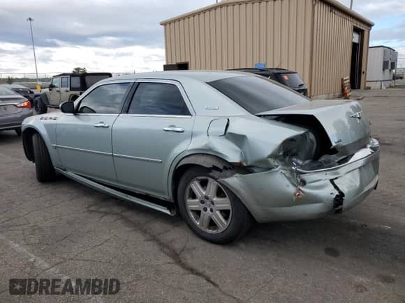 2006 Chrysler 300 C z VIN 2C3KK63H36H166917, wystawiony jako Copart lot #85285555 z przebiegiem 105 827 mil mil oraz Szkoda całkowita • Salvage title. Historia ofert i sprzedaży dostępna na DreamBid. Obrazek 2.