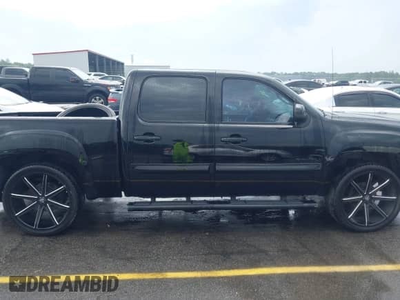 2013 GMC Sierra 1500 Denali with VIN 3GTP1XE28DG267855, listed as a IAAI auction lot 42116483 with 154,716 mi miles and . Bid and sale history available at DreamBid. Image 13.