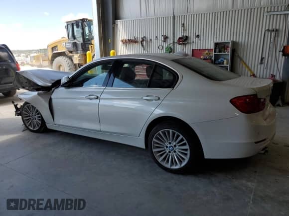 2015 BMW 3 Series 328i xDrive with VIN WBA3B3C55FJ985542, listed as a Copart auction lot 68098525 with Not provided miles and Salvage title. Bid and sale history available at DreamBid. Image 2.
