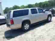 2009 Chevrolet Suburban 2LT z VIN 1GNFK26319J109681, wystawiony jako IAAI lot #42288393 z przebiegiem 250 381 mil mil oraz . Historia ofert i sprzedaży dostępna na DreamBid. Obrazek 4.