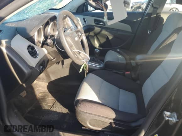 2015 Chevrolet Cruze LS with VIN 1G1PB5SH8F7188669, listed as a Copart auction lot 61000845 with 118,179 mi miles and Salvage title. Bid and sale history available at DreamBid. Image 7.