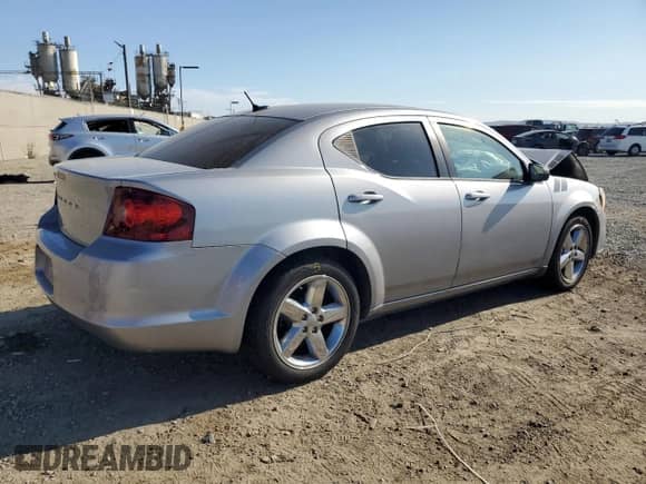 2013 Dodge Avenger SE with VIN 1C3CDZAB3DN658527, listed as a Copart auction lot 81234615 with 69,124 mi miles and Salvage title. Bid and sale history available at DreamBid. Image 3.
